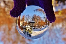 glass-ball-transparent-lantern-mirroring-glass-winter-snow.jpg